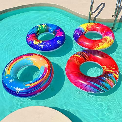 Top down view of inflated swimming rings and beach balls