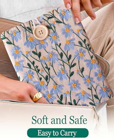 Lifestyle shot of blue and beige daisy embroidered book cover