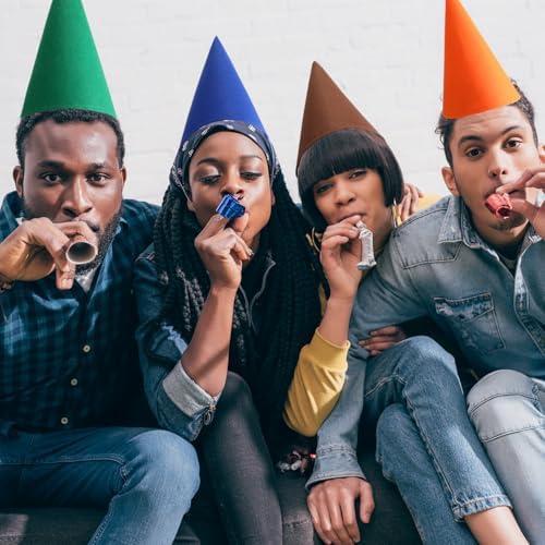 Flat lay of colorful crayon shaped party hats