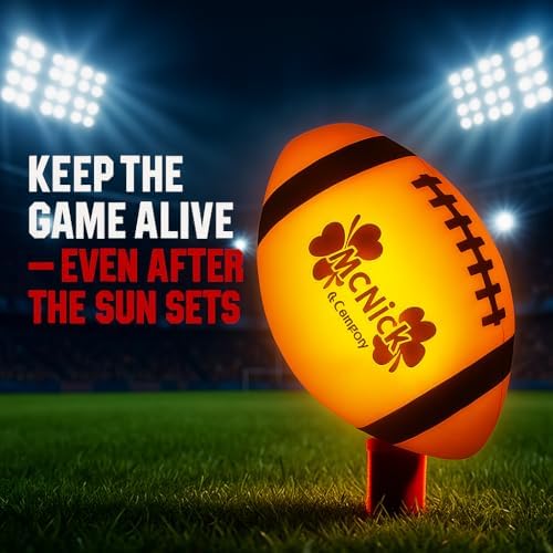 MCNICK & COMPANY impact activated LED football illuminating upon being caught mid air during an evening game.
