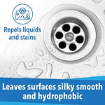 Streak free glass shower panel showing the liquid repellent properties of the nano ceramic spray.
