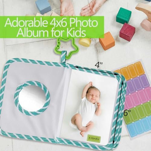 GPIRAL soft cloth baby book opened to reveal clear pockets holding four by six photos.
