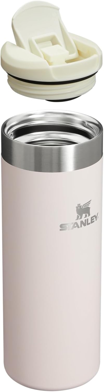 Stanley lightweight insulated travel mug displaying the locking drink through lid mechanism.