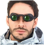 Ergonomic wearable bird watching binoculars illustrating the wide angle magnification lens layout.
