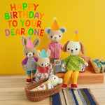 Muccibi mini party hats on small pet and plush toy