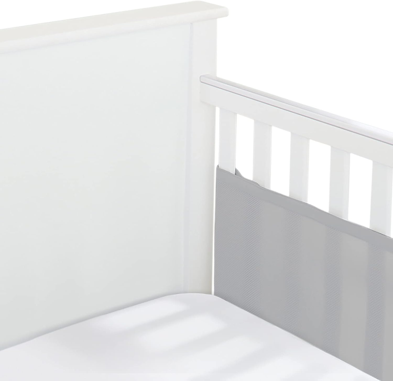 BreathableBaby gray mesh crib liner installed on a full size crib