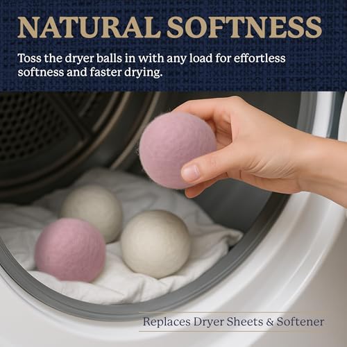 Farberware natural fabric softener wool balls tumbling with laundry inside a dryer machine.