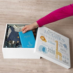 Open wooden memory box for nursery storage showing gray felt interior