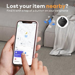 ATUVOS luggage tracker attached to a backpack zipper ring for travel tracking