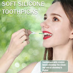 Ndzefan soft original dental picks demonstrating flexibility by gently bending the silicone handle.