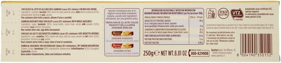 Sperlari Zanzibar soft nougat chocolate candy bar cut open to reveal whole roasted hazelnuts inside.