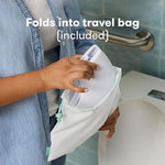 Frida Baby Fold-and-Go Portable Potty Seat for Toilet, Foldable Travel Potty Seat for Toddler, Fits Round & Oval Toilets, Non-Slip Base, Handles, Includes Free Travel Bag - Image 6