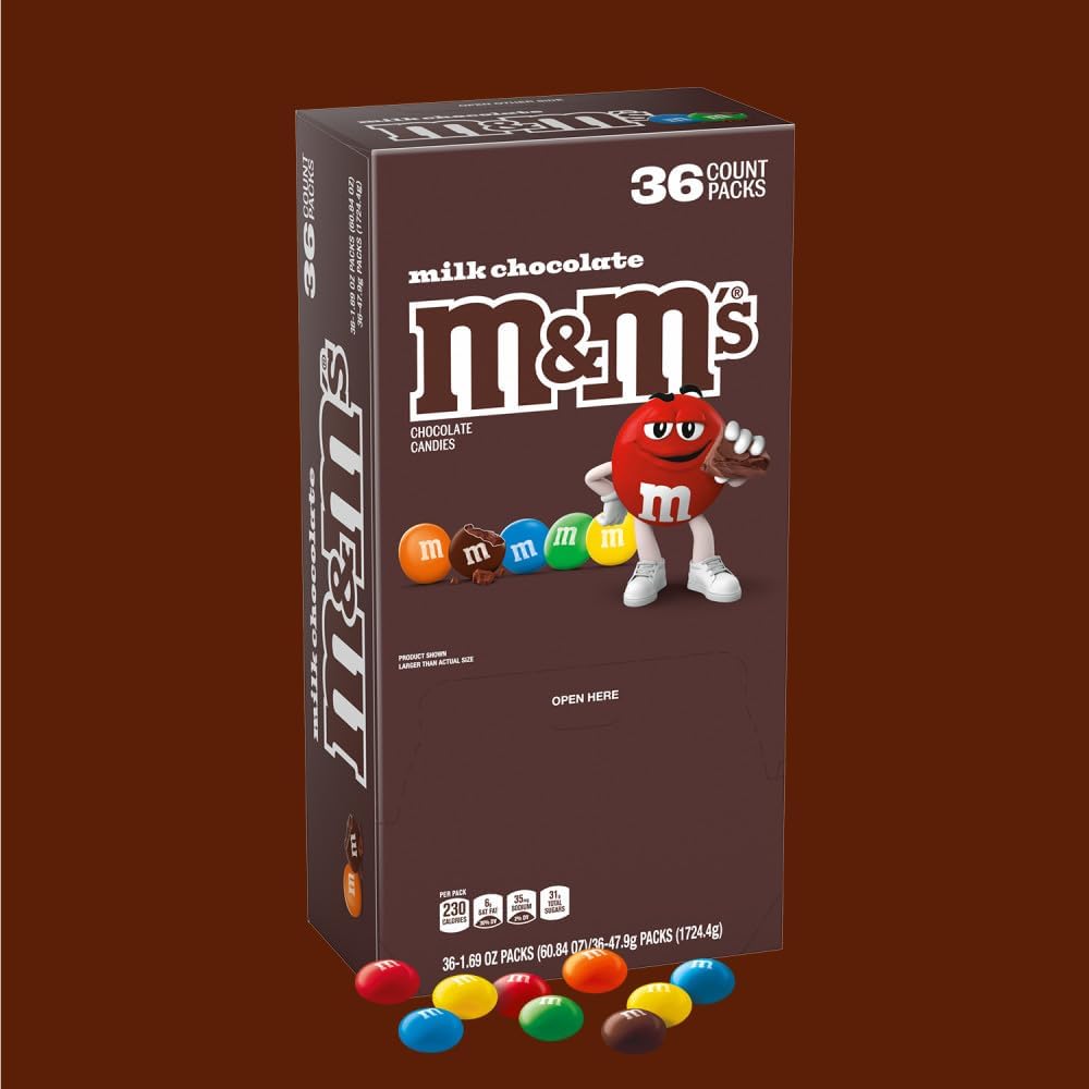 Open box of imported American M and Ms chocolate candies displaying colorful packaging