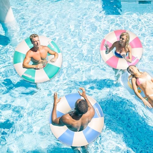 Assorted pink blue orange and teal inflatable swim rings