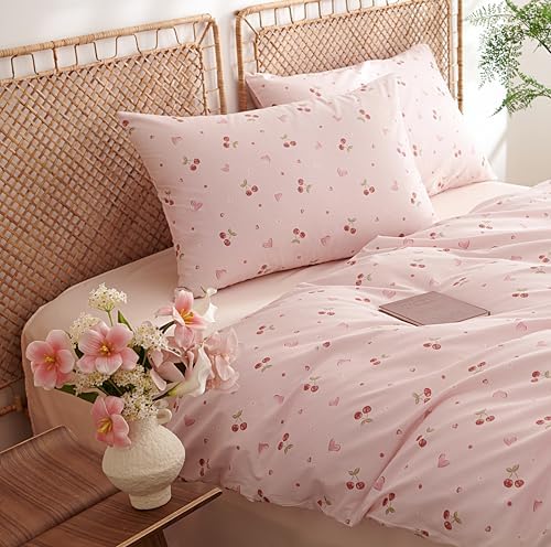 Close-up view of the 100 percent cotton reversible cartoon love pattern on the Sedefen coquette bedding set.