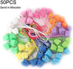 Assorted colorful tooth-shaped keepsake boxes for milk teeth