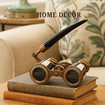 Close up view of the optical lenses and solid brass frame of the vintage binoculars