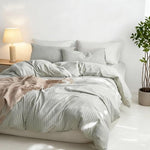 Interior corner ties highlighted inside the yarn dyed cotton comforter cover