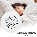 GOWENIC mini wired speaker being slipped inside a soft pillowcase demonstrating private nighttime listening setup.