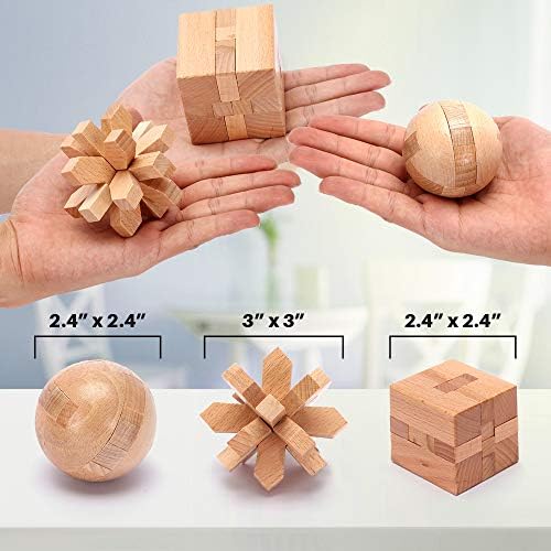 Array of six smooth stainless steel wire brain teaser puzzles displayed on a clean background.