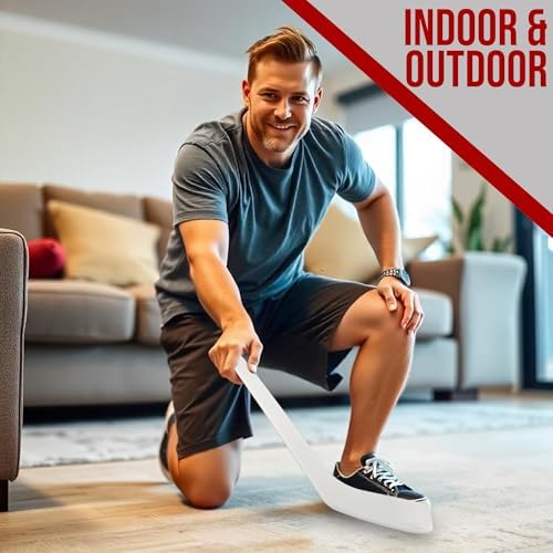 PRISP plastic mini hockey stick placed on a hardwood floor surface
