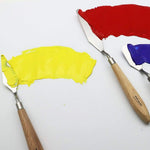 Palette knives mixing oil and acrylic paints