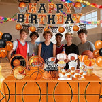 Close up of basketball cupcake toppers and party accessories
