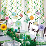 Close-up view of the pre-assembled double-sided sunflower and daisy cardstock cutouts hanging from shimmering green foil loops.