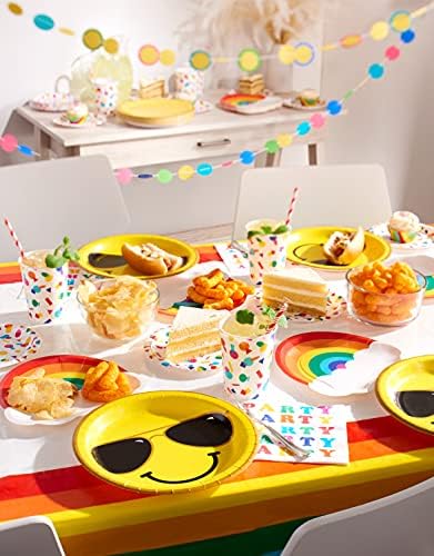 Close up of vibrant rainbow and cloud design on party plates