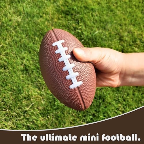 Mini toy football for kids being held by a child to show small scale.