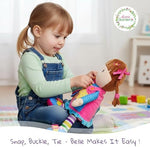 Close up of June Garden Belle doll clothing fasteners for fine motor skills