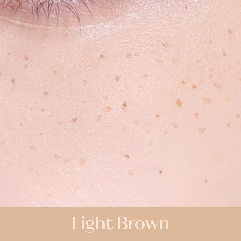 ETUDE Naturally Freckle Pen in light brown creating natural faux freckles on cheekbones.