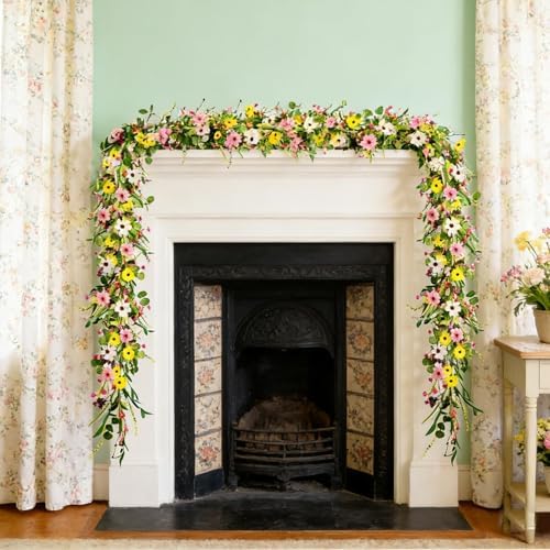 Two pieces of YLOLUL wildflower garlands connected together to decorate a long staircase banister.