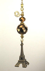Full length view of the artisan Eiffel Tower fan pull showing the 5-inch chain and snap-on connector.