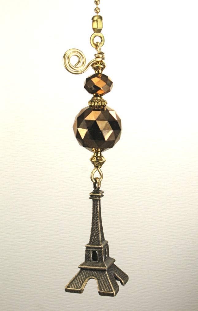 Full length view of the artisan Eiffel Tower fan pull showing the 5-inch chain and snap-on connector.