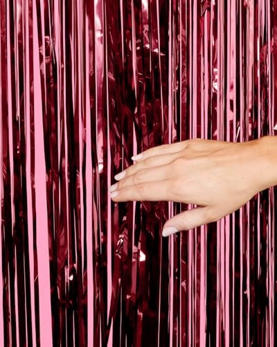 Deep wine red metallic foil backdrop panel close up highlighting the extra shiny reflective texture