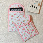 Close up of quilted cotton fabric and floral pattern on Kindle sleeve