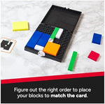 White starter pieces placed on the gridlock board according to a challenge card.