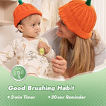 Close up view of the dentist-designed compact brush head on the green Papablic Max infant toothbrush.