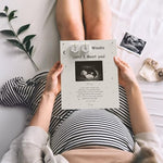 EURSET ultrasound photo frame displayed on a tabletop holding a standard four by three inch baby scan.