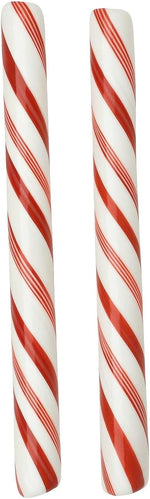 Two jumbo peppermint candy sticks arranged neatly showing traditional Christmas spiral pattern