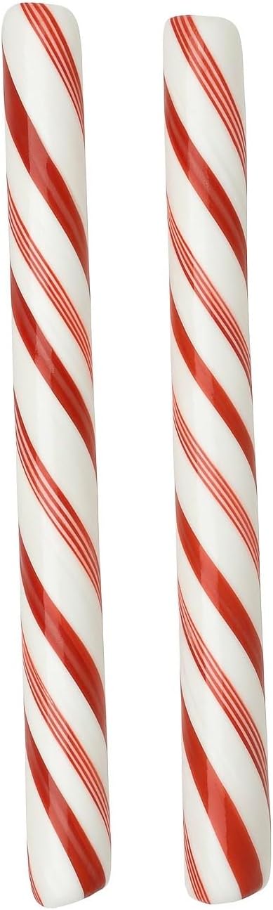 Two jumbo peppermint candy sticks arranged neatly showing traditional Christmas spiral pattern