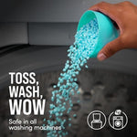 Close up of the water soluble Downy Unstopables laundry beads designed for advanced odor protection.