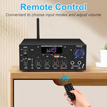 Romicta compact media console setup showcasing bookshelf speaker integration and smartphone wireless connection