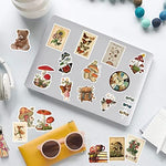 Various waterproof scrapbook journal sticker designs spread out
