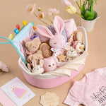 Glowsprout newborn girl gift set close up of cotton outfits and swaddle blankets