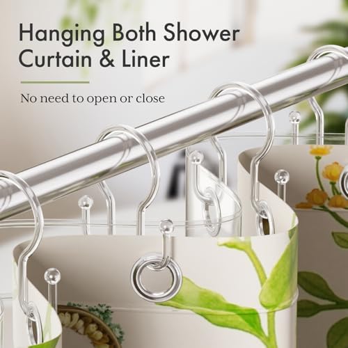 Smooth gliding clear plastic shower curtain rings attached to a waterproof liner