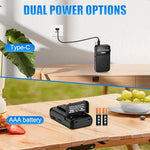 Black Prunus J-555 mini radio held in hand for size reference