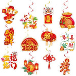 Two traditional red paper lanterns hung symmetrically near a home entryway to invite prosperity and wealth.