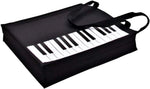 COCOMK piano keys handbag front view showing the musical keyboard graphic